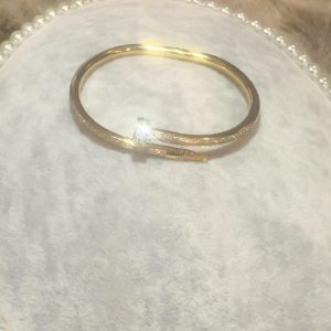 Bracelet Clou rigide perle asserti