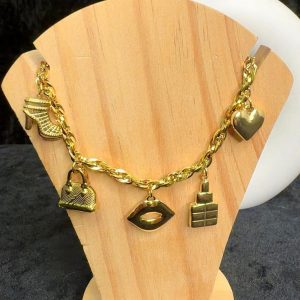 Gourmette bibelot style sac et bouche